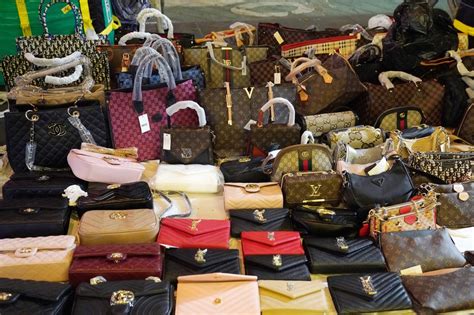 Dozens of fake designer purse vendors selling knock